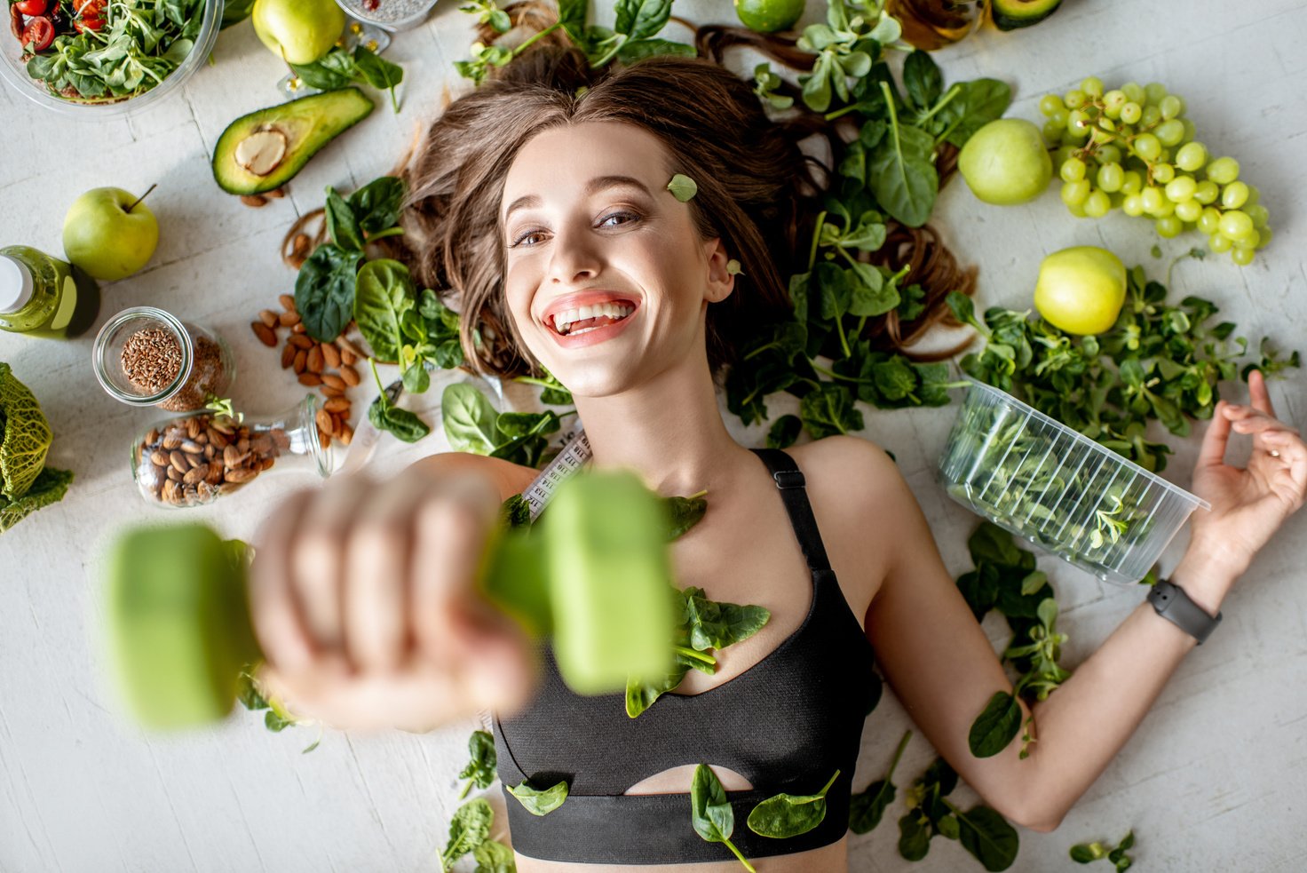 Portrait of a Sports Woman with Healthy Food